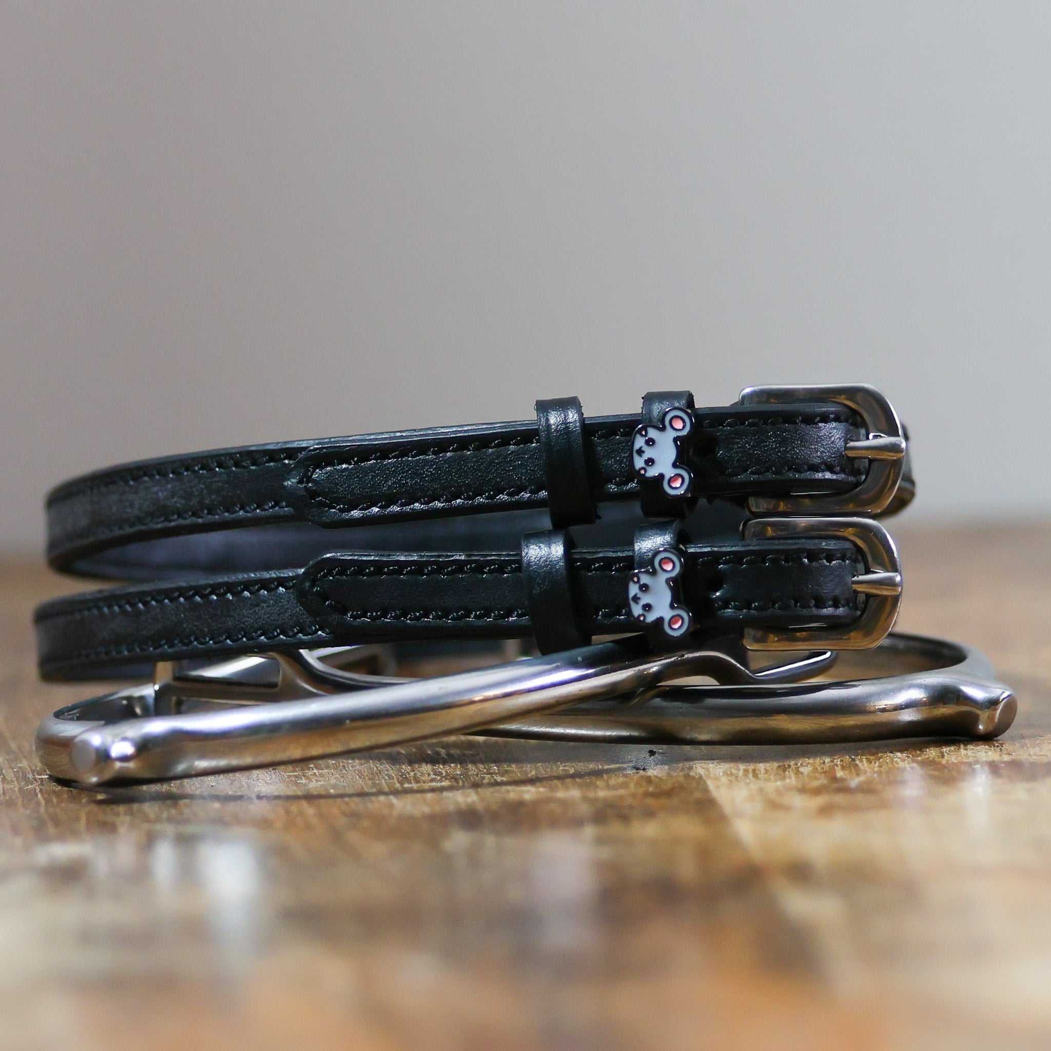 ManeJane Mouse Spur Straps Spur Straps — black leather, non-stretch, hero image for English riders.