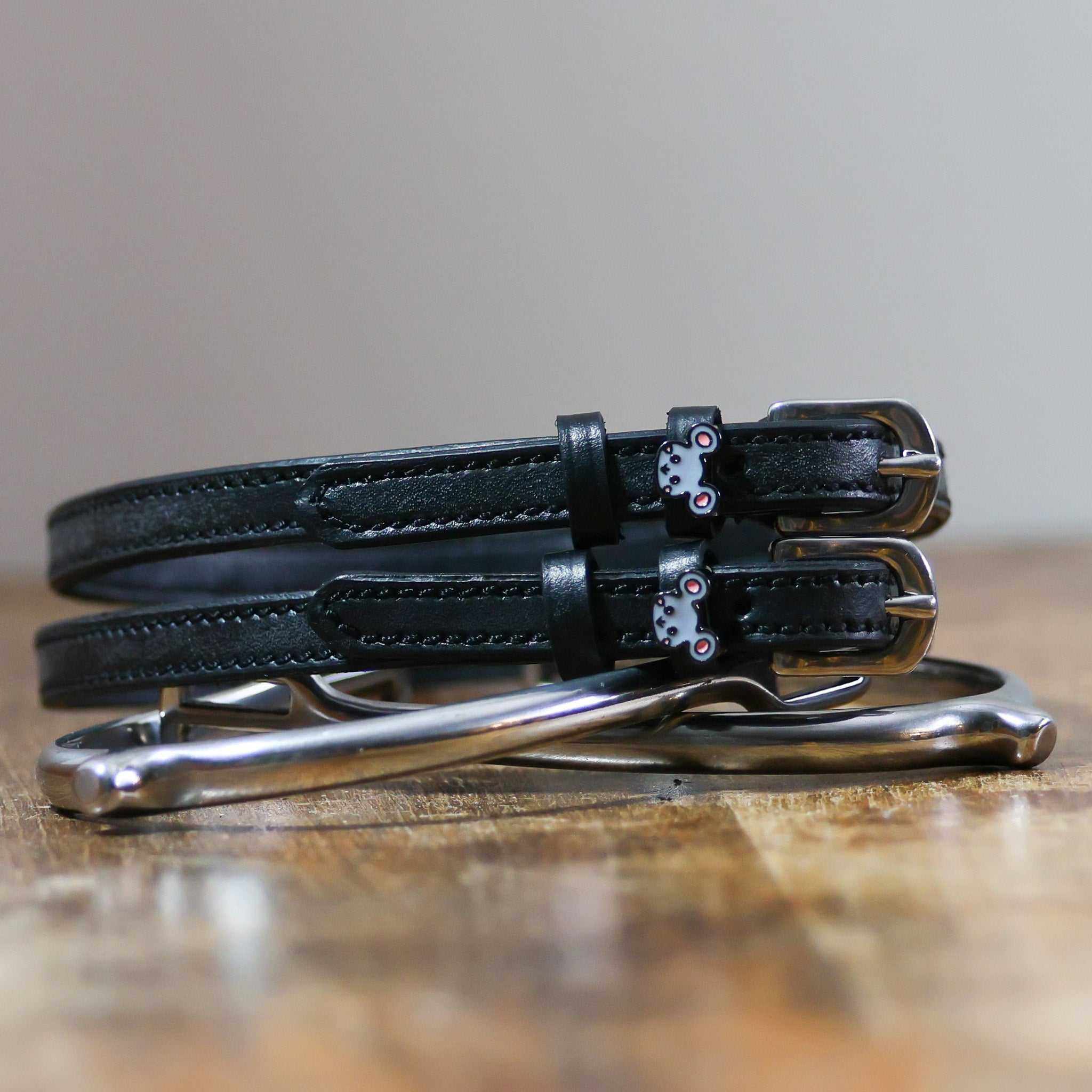 ManeJane Mouse Spur Straps Spur Straps — black leather, non-stretch, hero image for English riders.