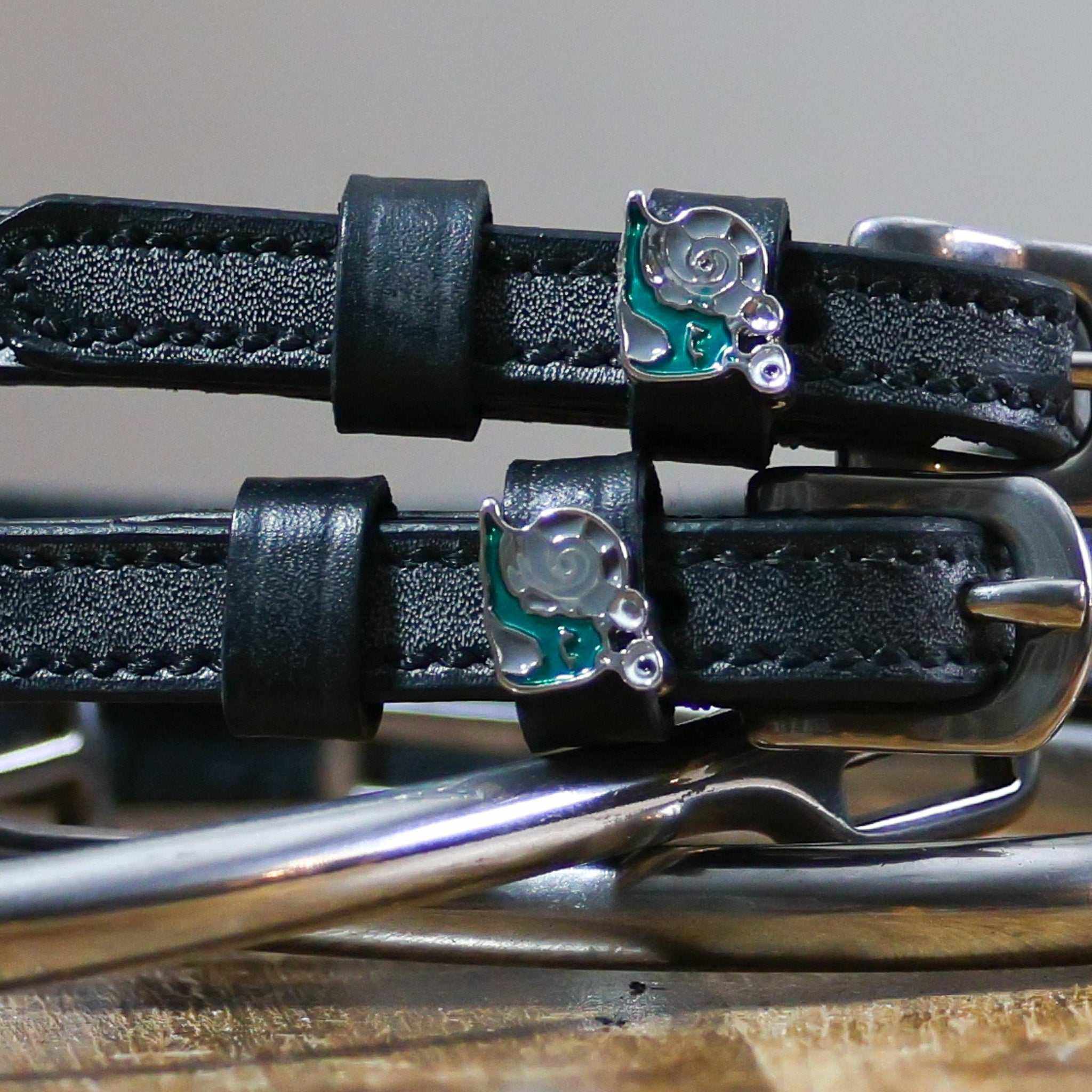 Black leather Snail Spur Straps with stainless steel buckle and custom snail charm