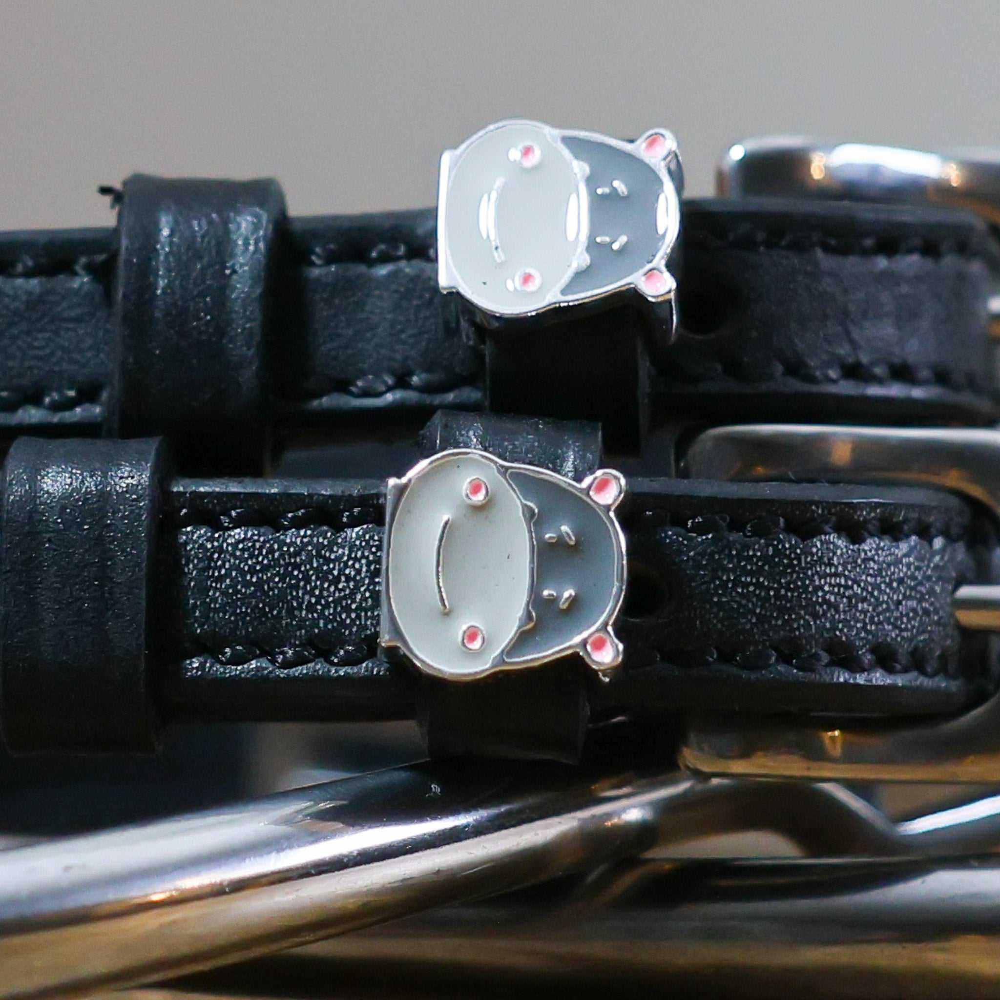 Black leather Hippo Face Spur Straps with stainless steel buckle and custom hippo charm