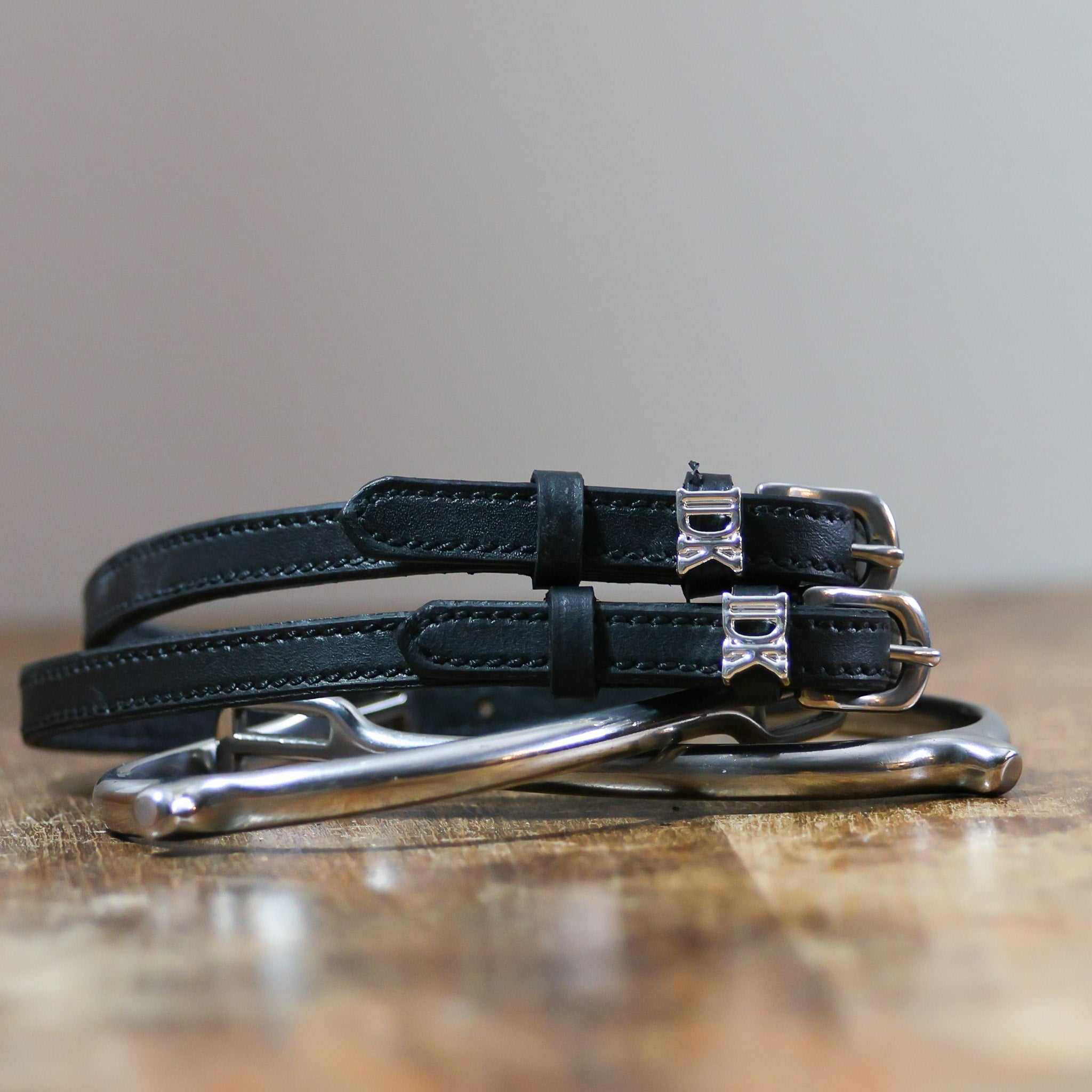 ManeJane I Don't Know ? Spur Straps Spur Straps — black leather, non-stretch, hero image for English riders.