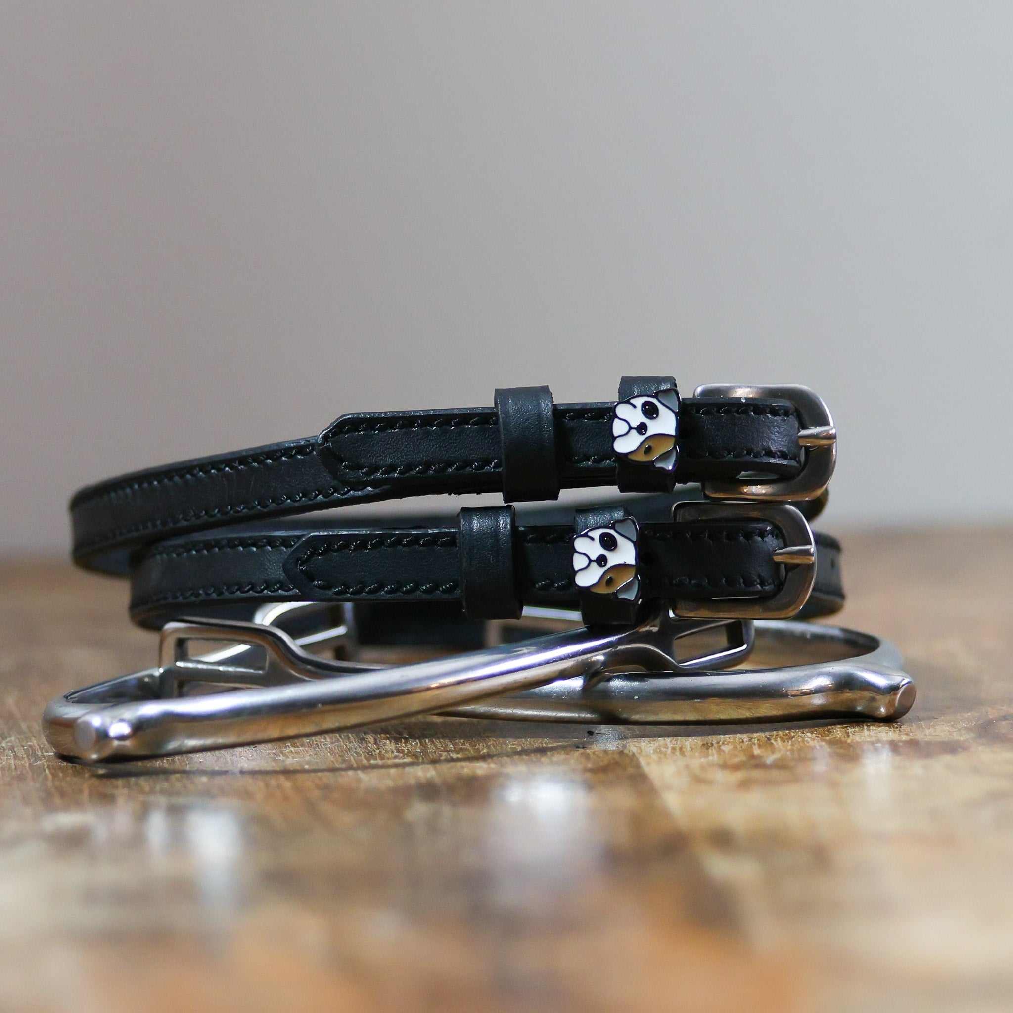 ManeJane Dog - Bulldog Spur Straps Spur Straps — black leather, non-stretch, hero image for English riders.