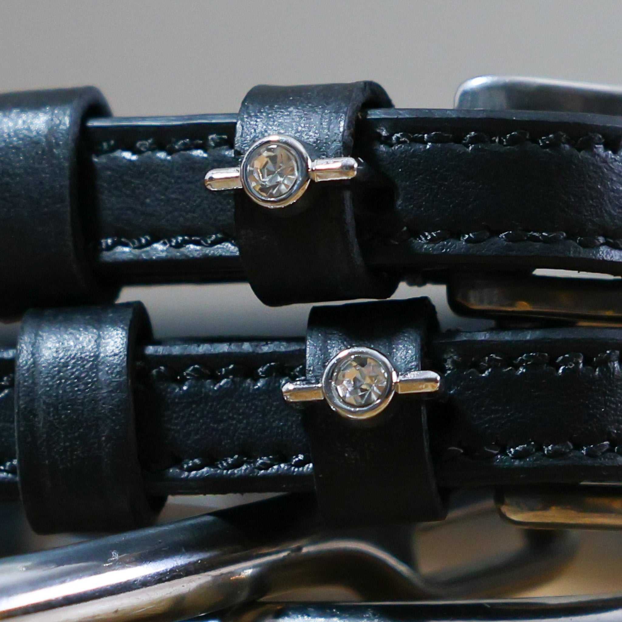Black leather Single Clear Stone Spur Straps with clear stone charm and stainless steel buckle close-up
