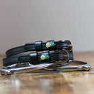 ManeJane Pineapple Spur Straps Spur Straps — black leather, non-stretch, hero image for English riders.