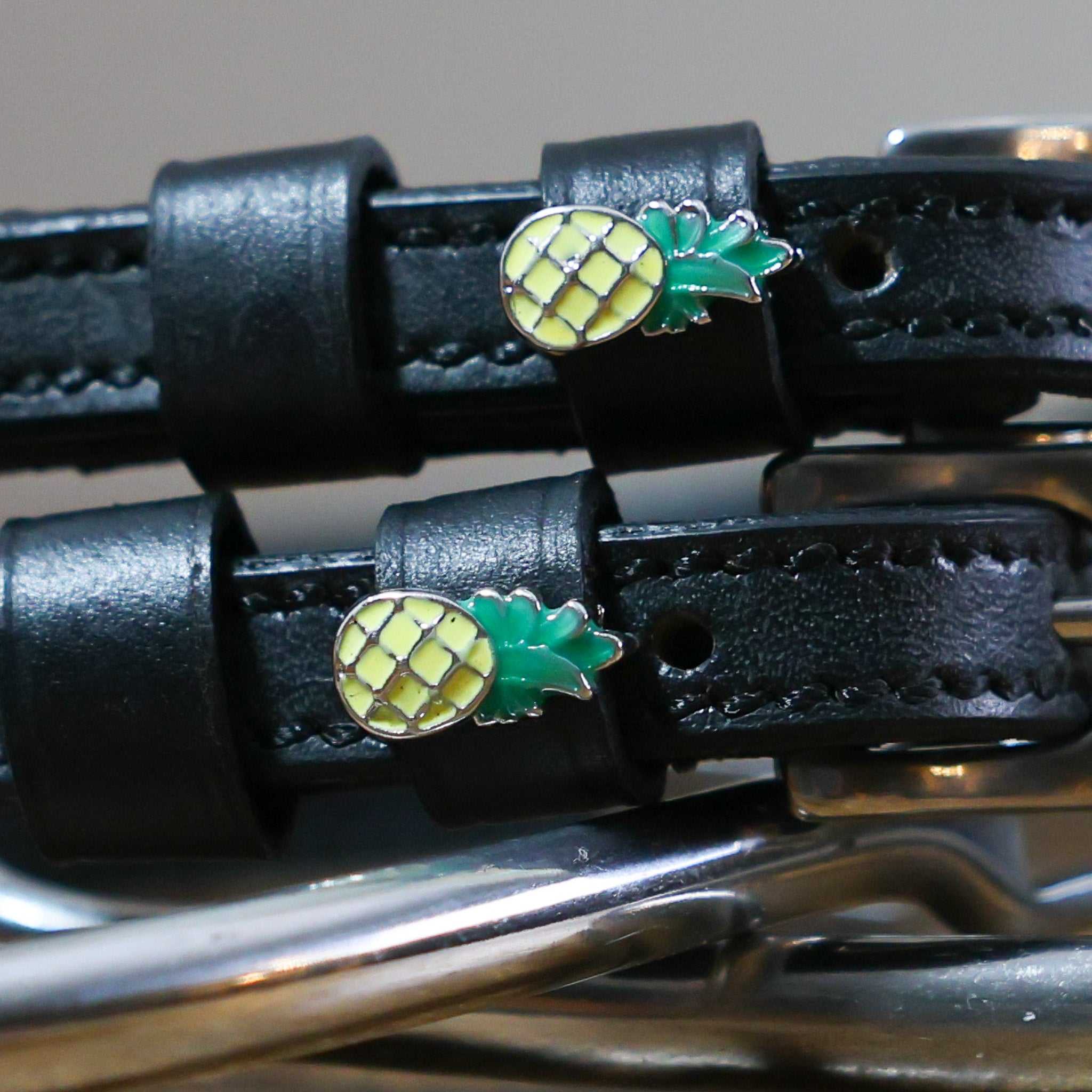 Black leather Pineapple Spur Straps with stainless steel buckle and pineapple charm