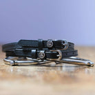 Black leather Capricorn Spur Straps with stainless steel buckle and custom charm by ManeJane
