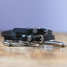Black leather Capricorn Spur Straps with stainless steel buckle and custom charm by ManeJane