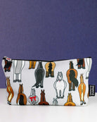 Butts zip pouch in white, printed with a line-up of cartoon horse hindquarters, by Dreamers & Schemers