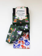 Jump for Joy youth boot socks shown folded with the included spare sock and patterned cuff