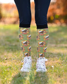Autumn Leaves custom photo equestrian boot socks, worn outdoors with sneakers, by Dreamers & Schemers