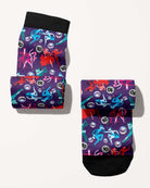 Prancing with the Stars Limited Edition boot socks, dancing couples and disco balls on deep purple, rolled, showing the pattern repeat, by Dreamers & Schemers