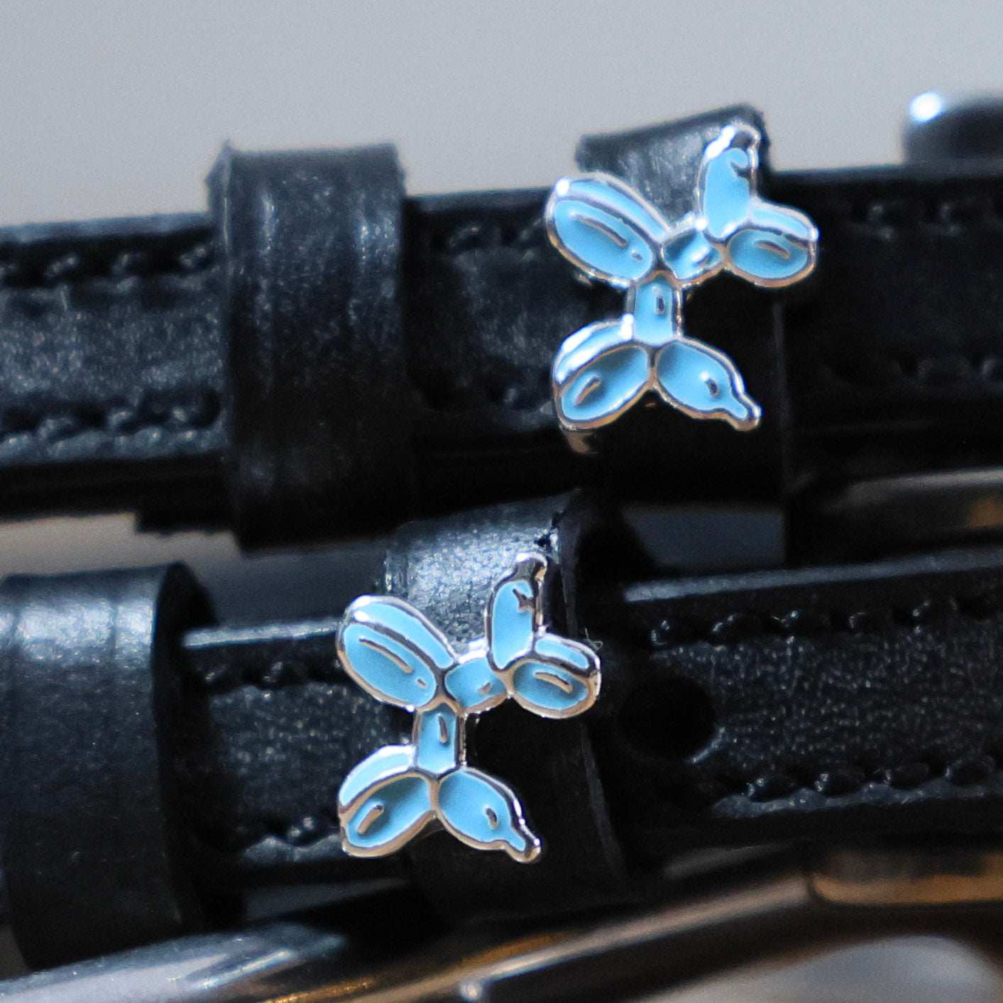 Black leather Balloon Puppy Spur Straps with stainless steel buckle and custom charm