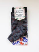 Laser Cats boot socks shown folded with the included spare sock and printed cuff detail
