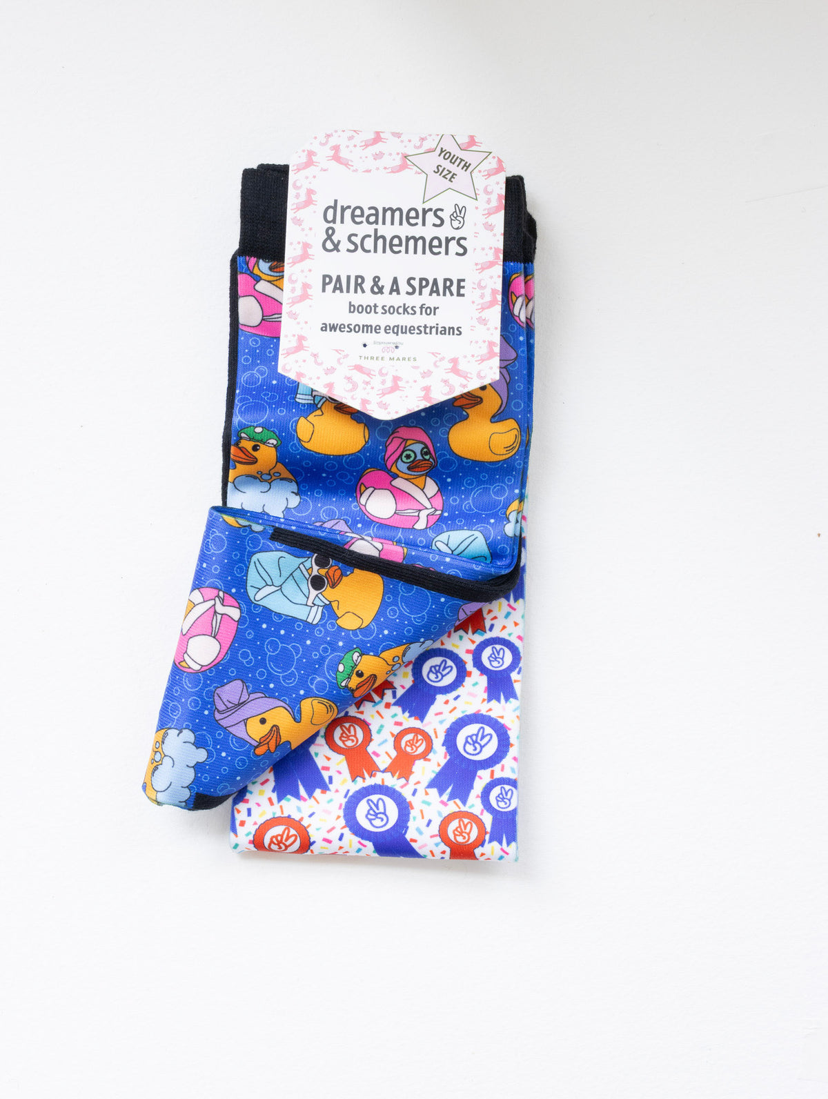 Rub A Dub Duck youth boot socks shown folded with the included spare sock and patterned cuff