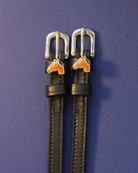 Bay horse-head charm spur straps in black leather on a blue-violet background