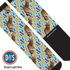 Bright light blue custom boot socks with cat and trophy pattern from Dreamers & Schemers