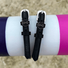 ManeJane D-ring spur straps wrapped around a white bottle outdoors