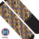Custom boot socks with a cat and trophy pattern on dark grey background