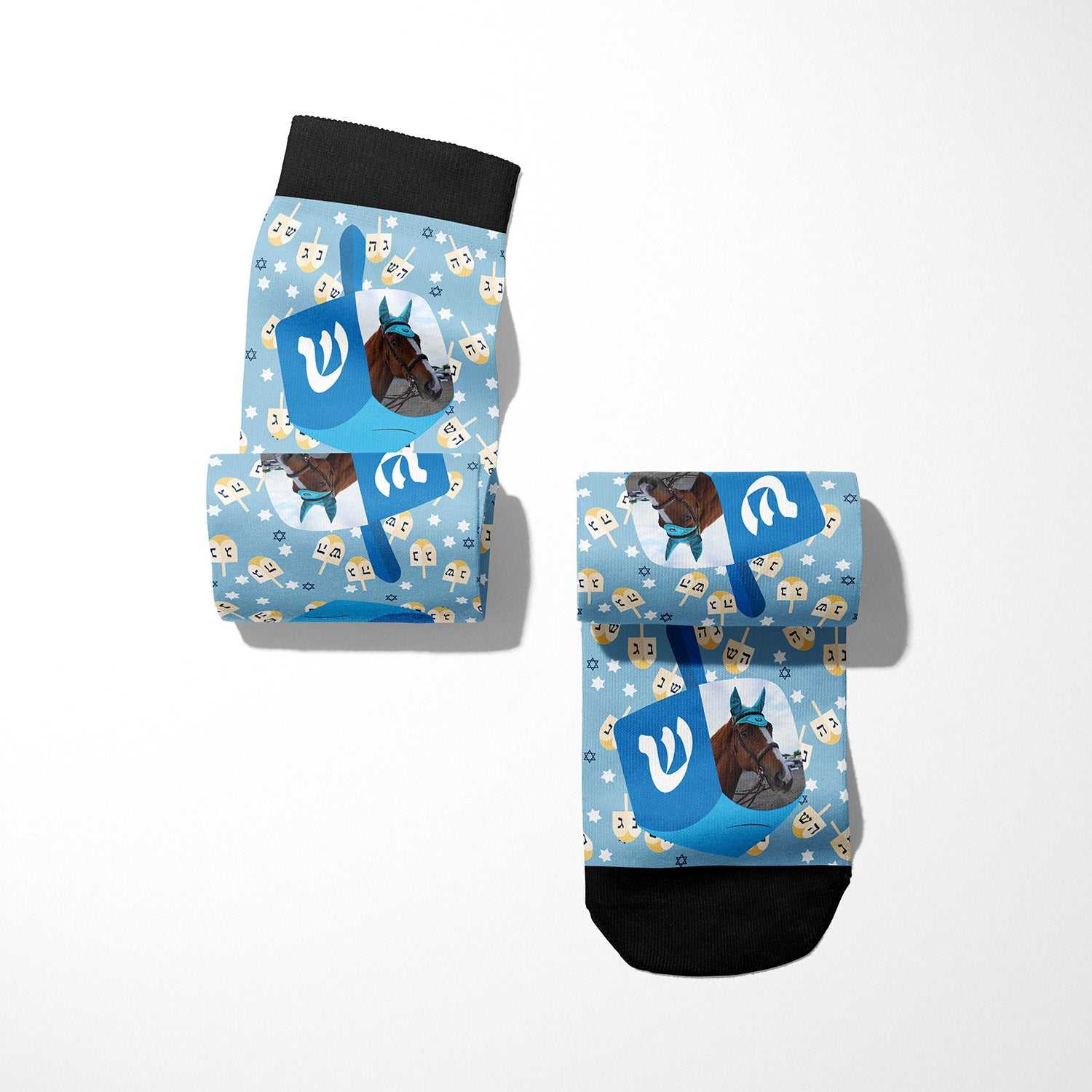Custom socks with blue dreidel and horse design on light blue background