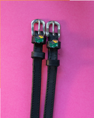 Black leather dumpster fire charm spur straps with silver buckles on hot pink