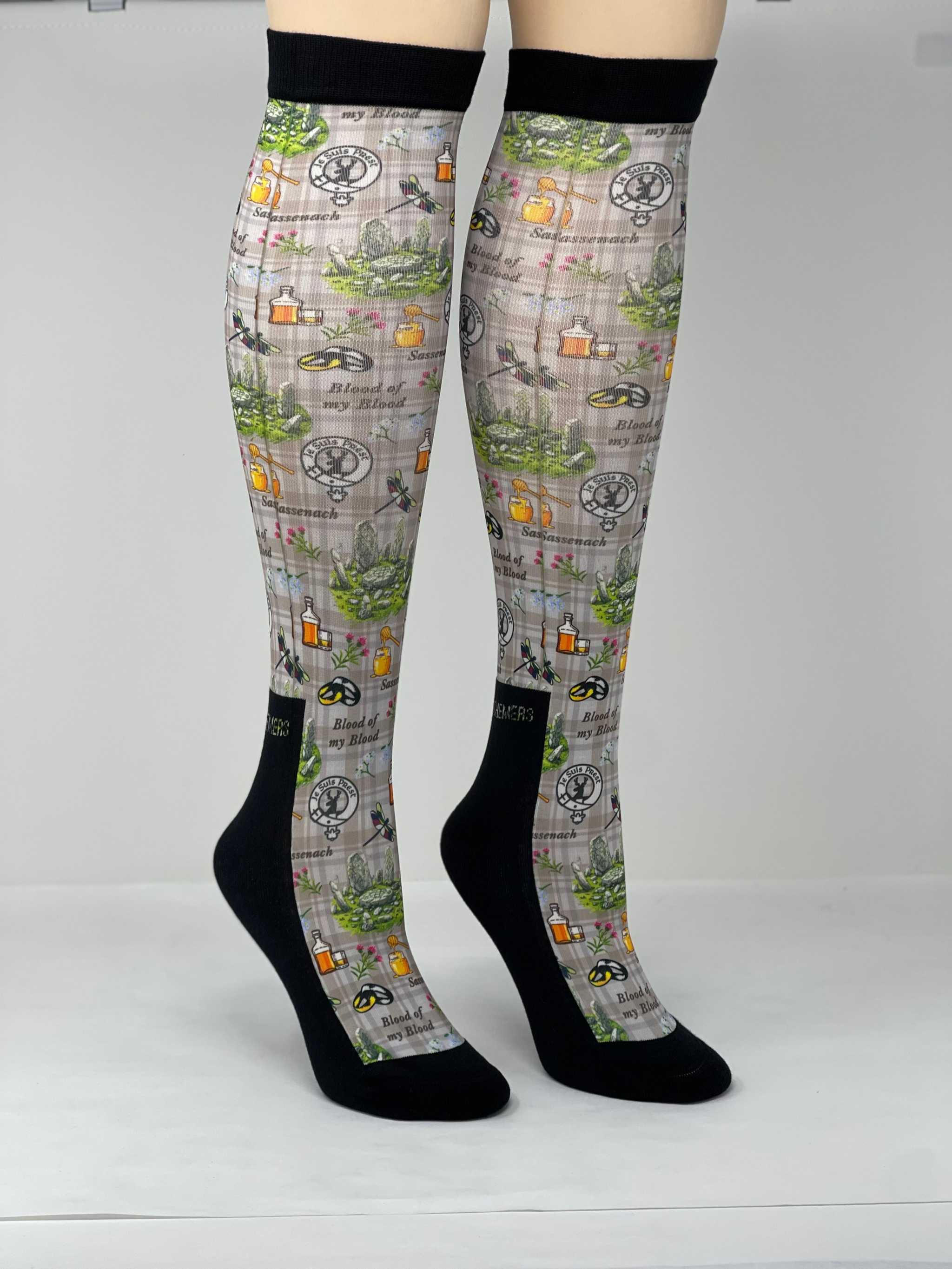 Limited edition Outlander boot socks with unique potion-themed design, made in the USA, crafted from cotton blend, one size fits most