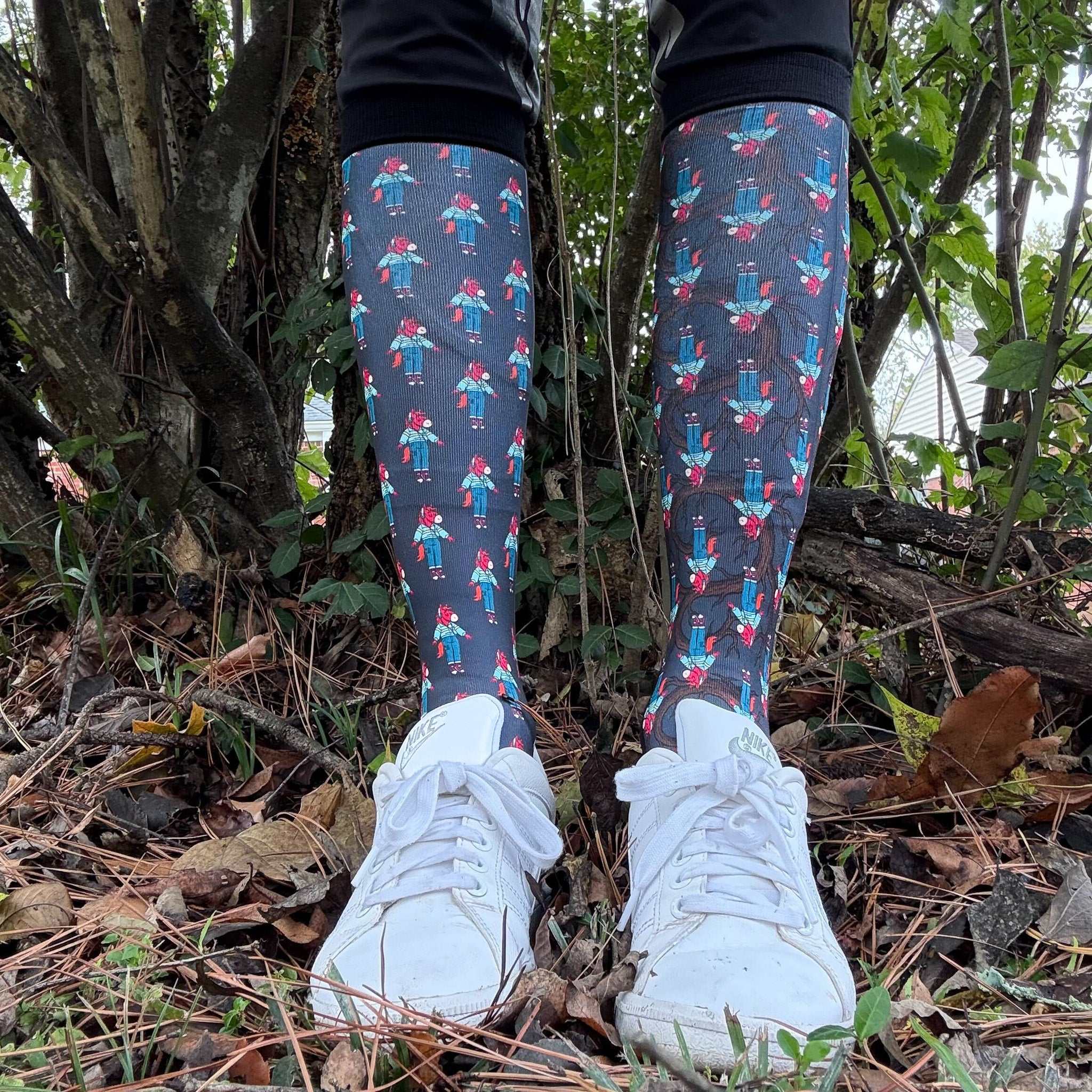 Limited edition Trotting Up That Hill boot socks with vibrant and dark parallel universe designs, made in the USA