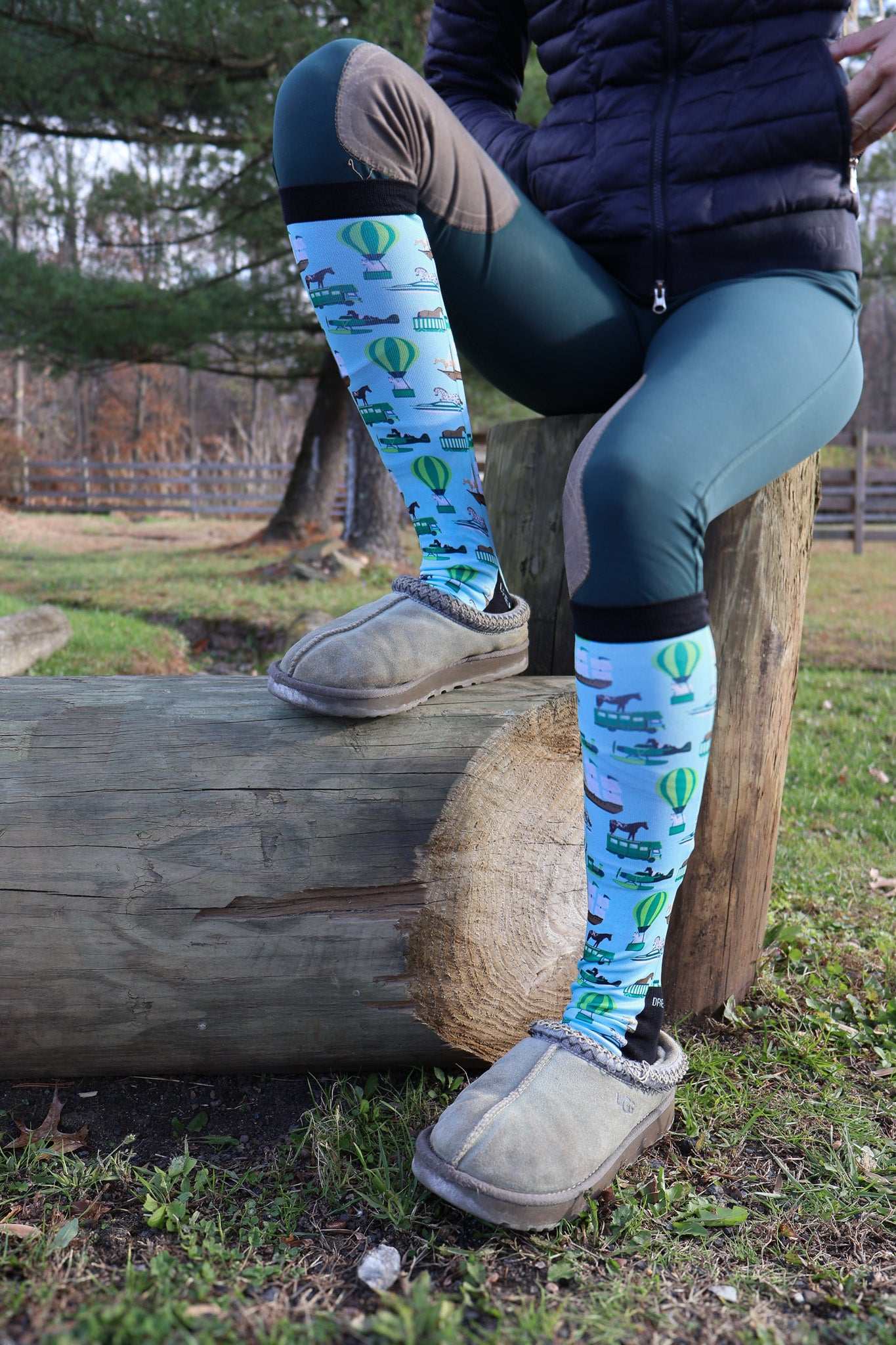 Limited Edition Pony Island Pony Transport Socks with colorful pony and hot air balloon design worn outdoors
