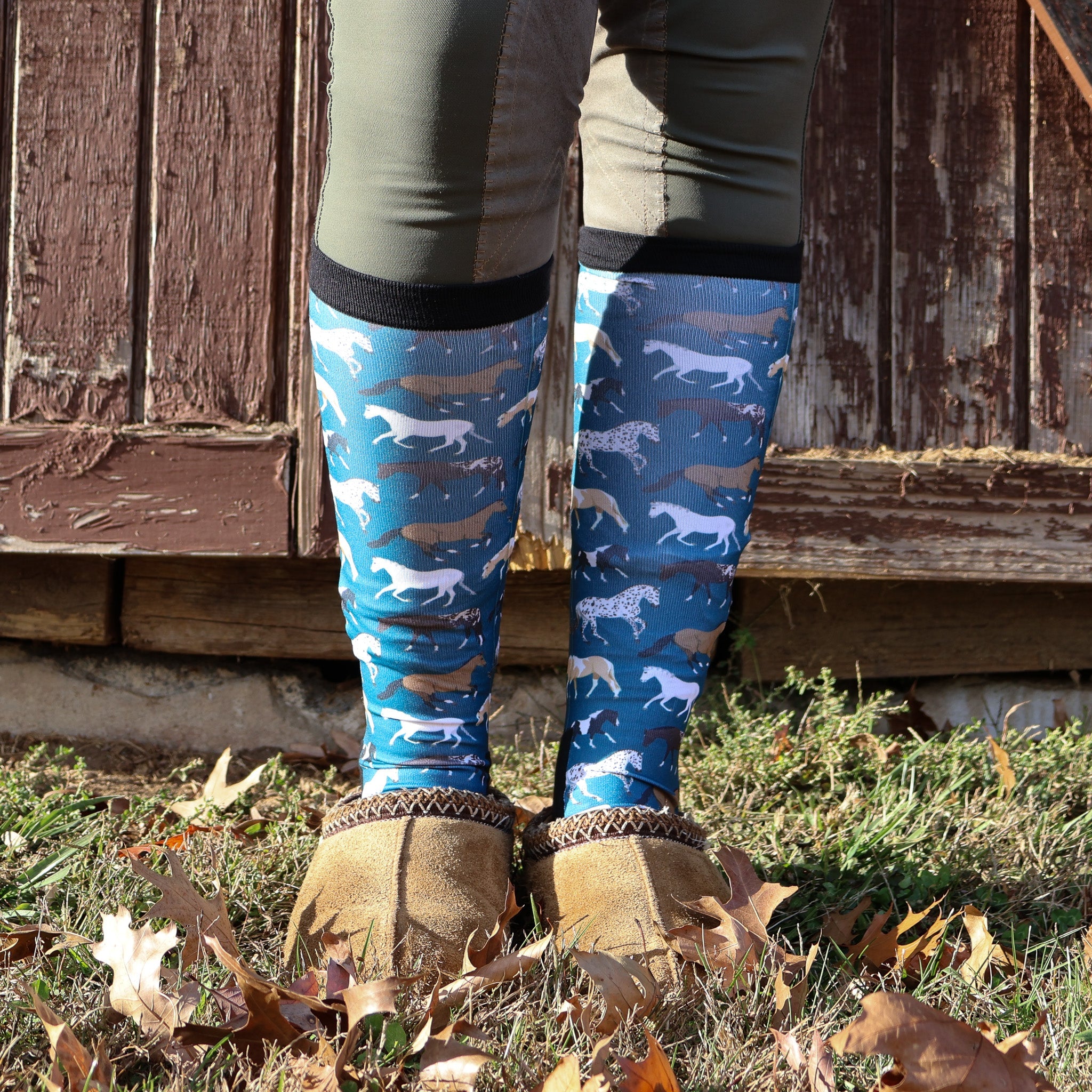 Limited Edition Pony Island Blue Ponies Socks with horse print worn with slippers outdoors