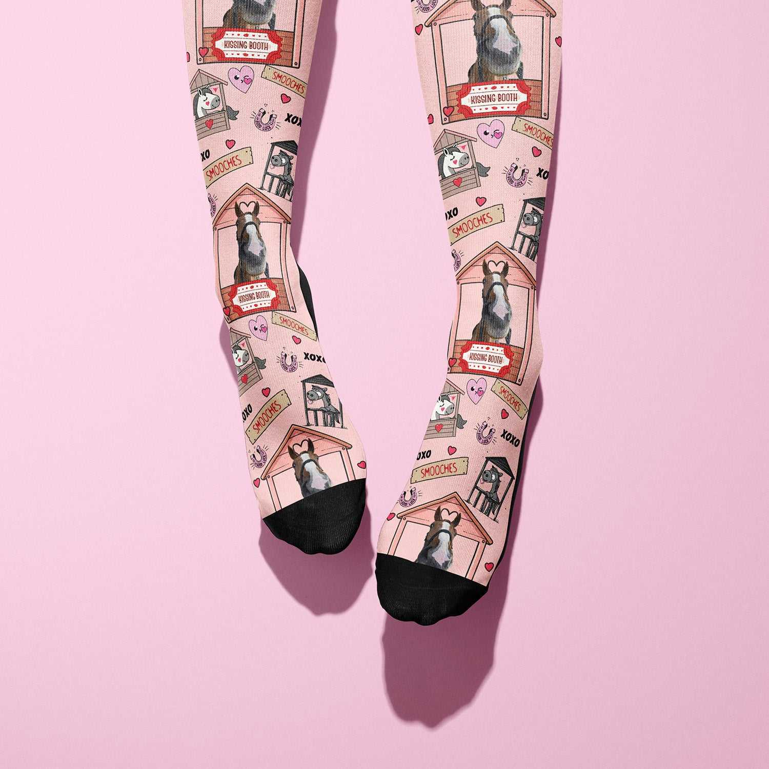 Custom pink boot socks with kissing booth horse design and black toes