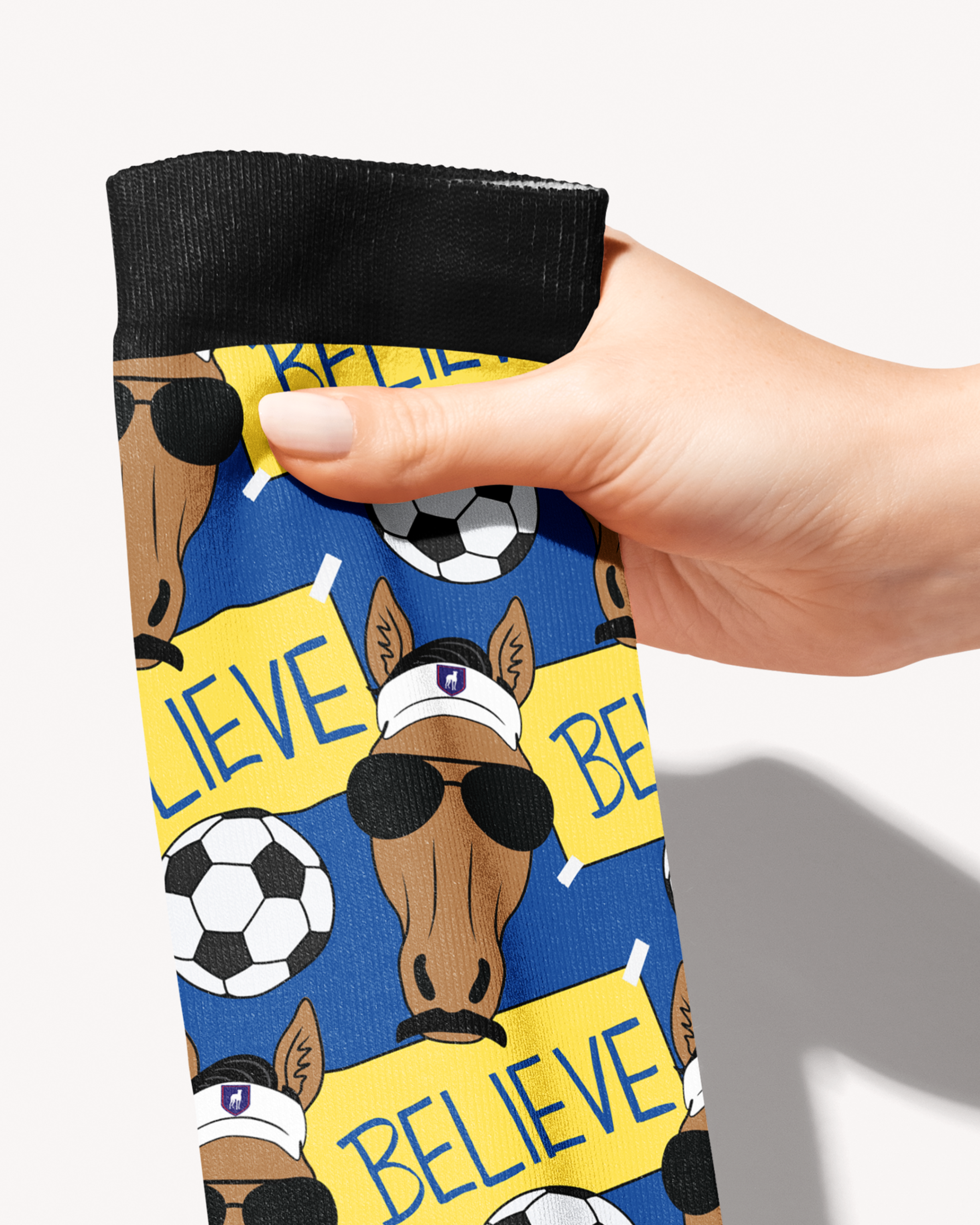 Keep Believin limited edition boot socks with blue and yellow soccer ball and coach print