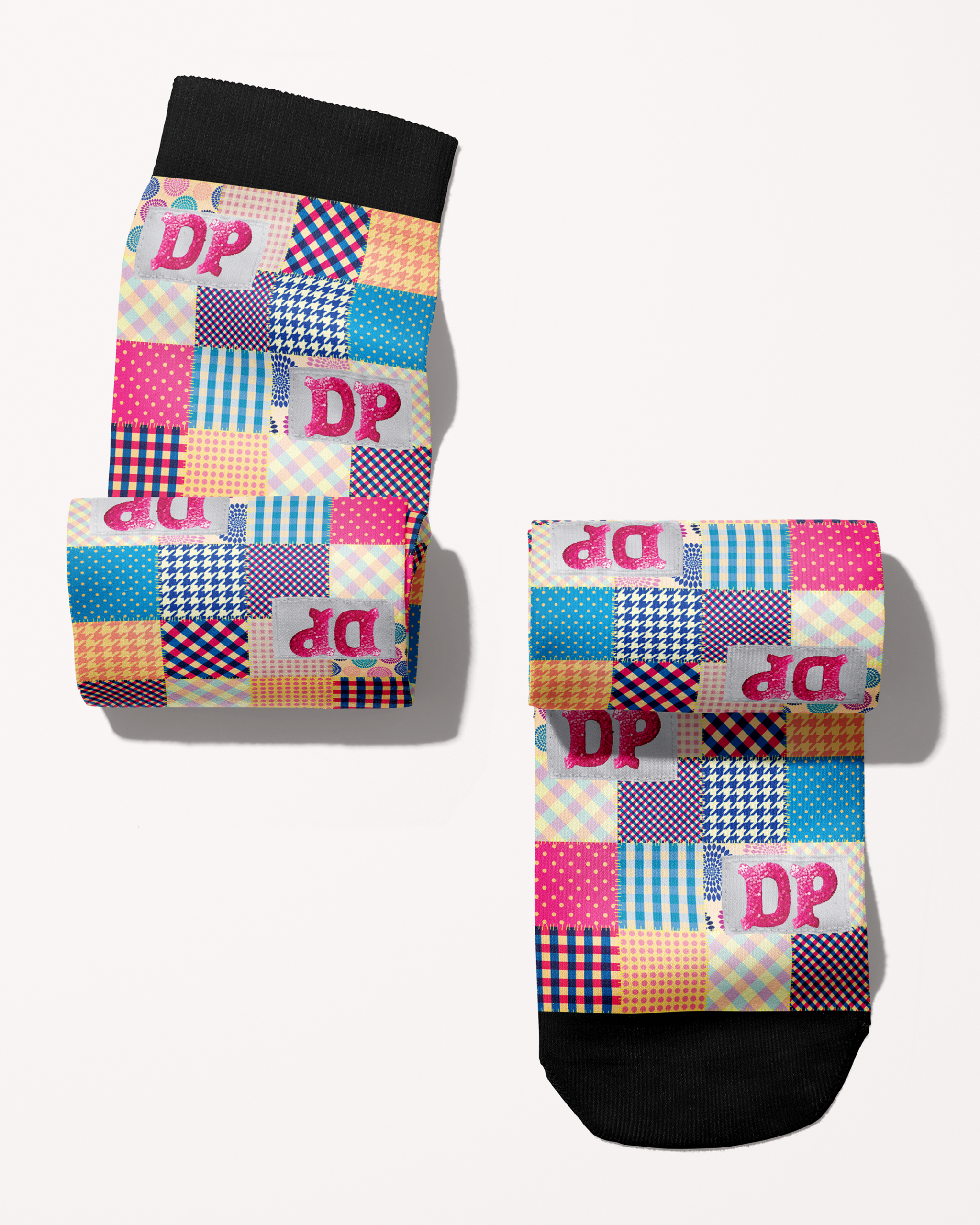 Socks of Many Colors boot socks rolled into a pair, DP patchwork pattern in pink and blue