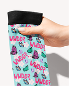 Close-up of the What Would Dolly Do? pattern — pink butterflies, florals and WWDD? text on mint green, by Dreamers & Schemers