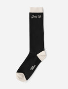 Black and white Giddy Up Tall Knit Sock with cushioned sole and "Giddy Up" text detail