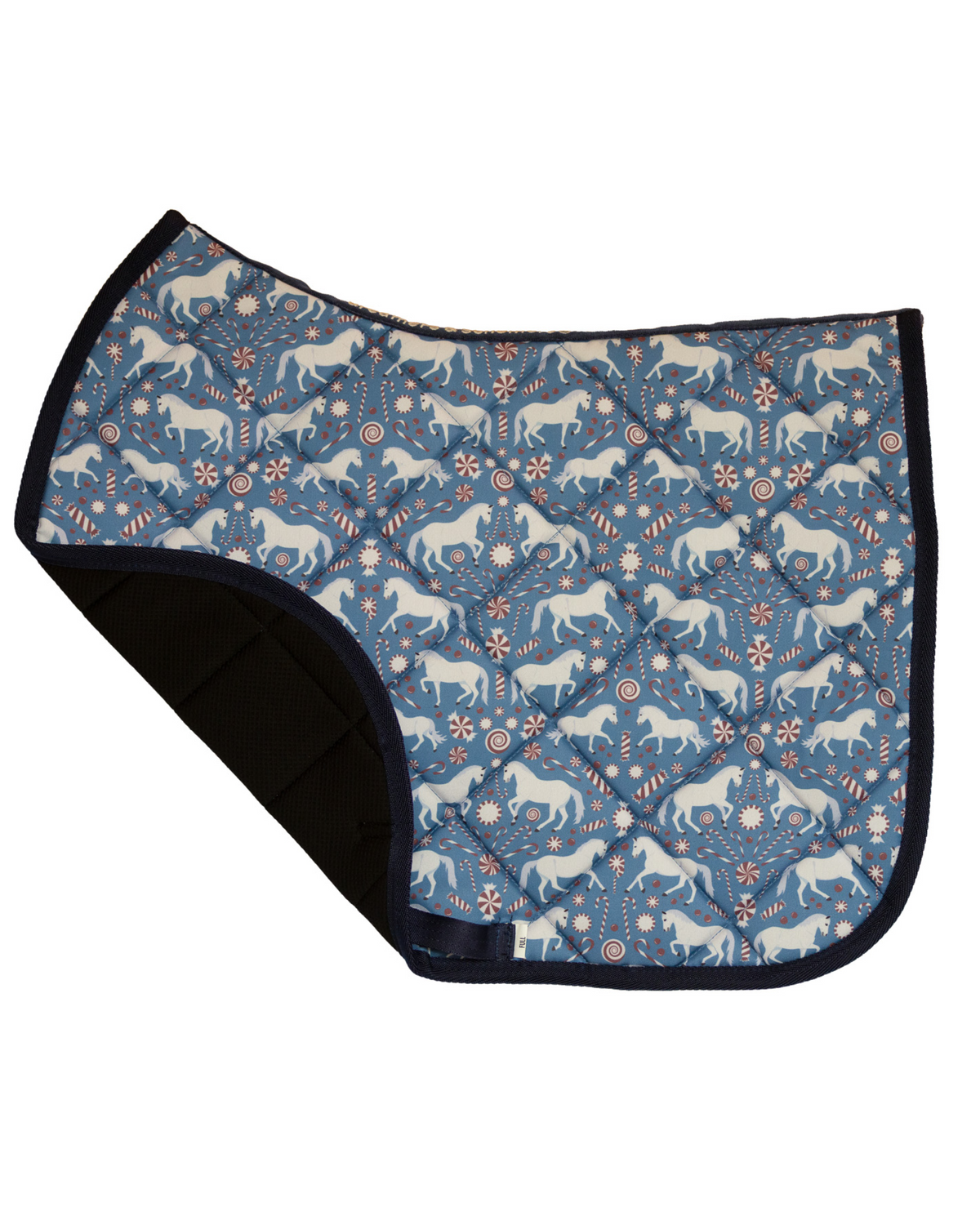 The Pony Island Peppermint Ponies saddle pad folded back to show the breathable mesh underside and quilted lining