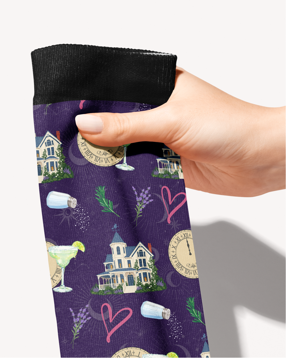 Close-up of the Midnight Margaritas sock print: purple ground with margaritas, spilled salt, lavender sprigs and pink hearts