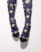 Midnight Margaritas knee-high boot socks shown from the front with contrast black toes and deep purple patterned leg