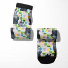 Custom solo socks featuring personalized horse images and colorful lucky charm patterns on Dreamers & Schemers Boot Socks.