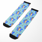 Custom Flower with Stable Snackies Socks featuring playful animal and stable-themed pattern on blue background with black toe and cuff accents