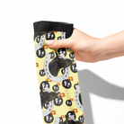 Custom Horseshoe socks with F bombs and horse photo design held by hand on yellow background