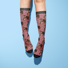 Custom Solo Socks featuring personalized horse photo with pink petals pattern on knee-high boot socks.