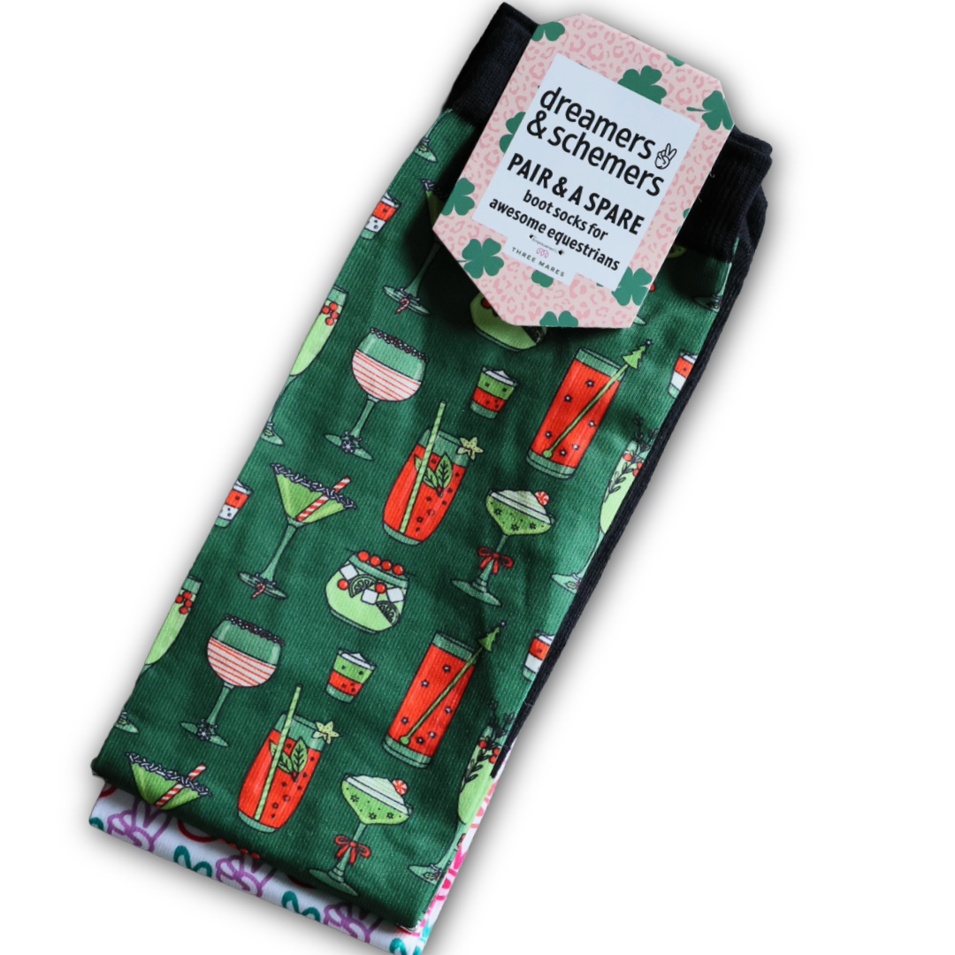 Green riding boot socks with colorful cocktail drink pattern, flat seam toe, terry foot bottom, and stretchy black top, includes spare sock, one size fits most.