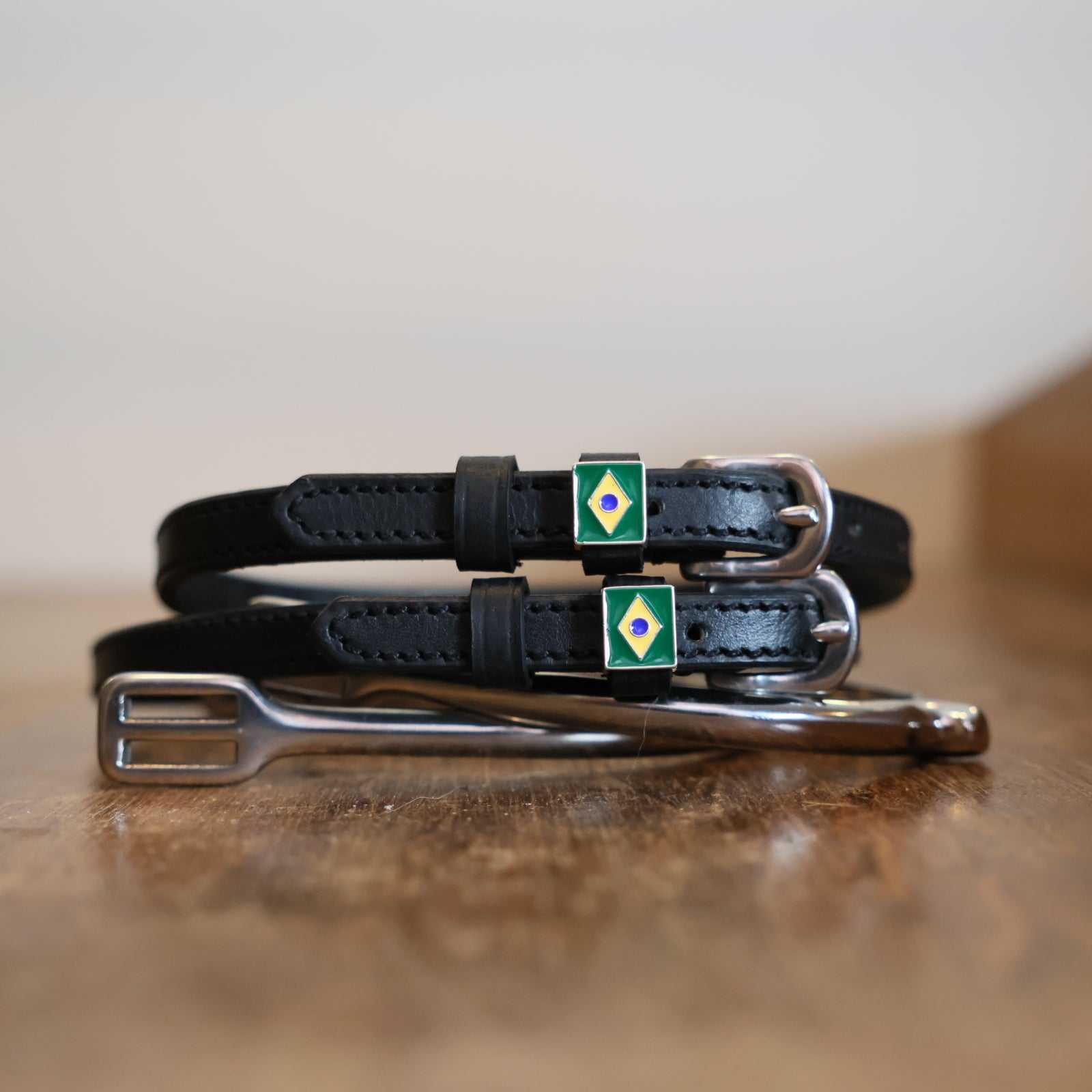 Black leather Brazil Flag Spur Straps with stainless steel buckle and custom charm