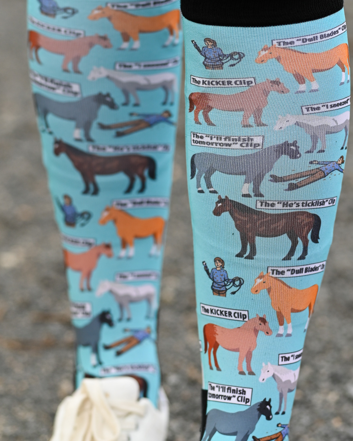 Close crop of the Clipart boot sock print, horses captioned with every clipping fail on pale aqua