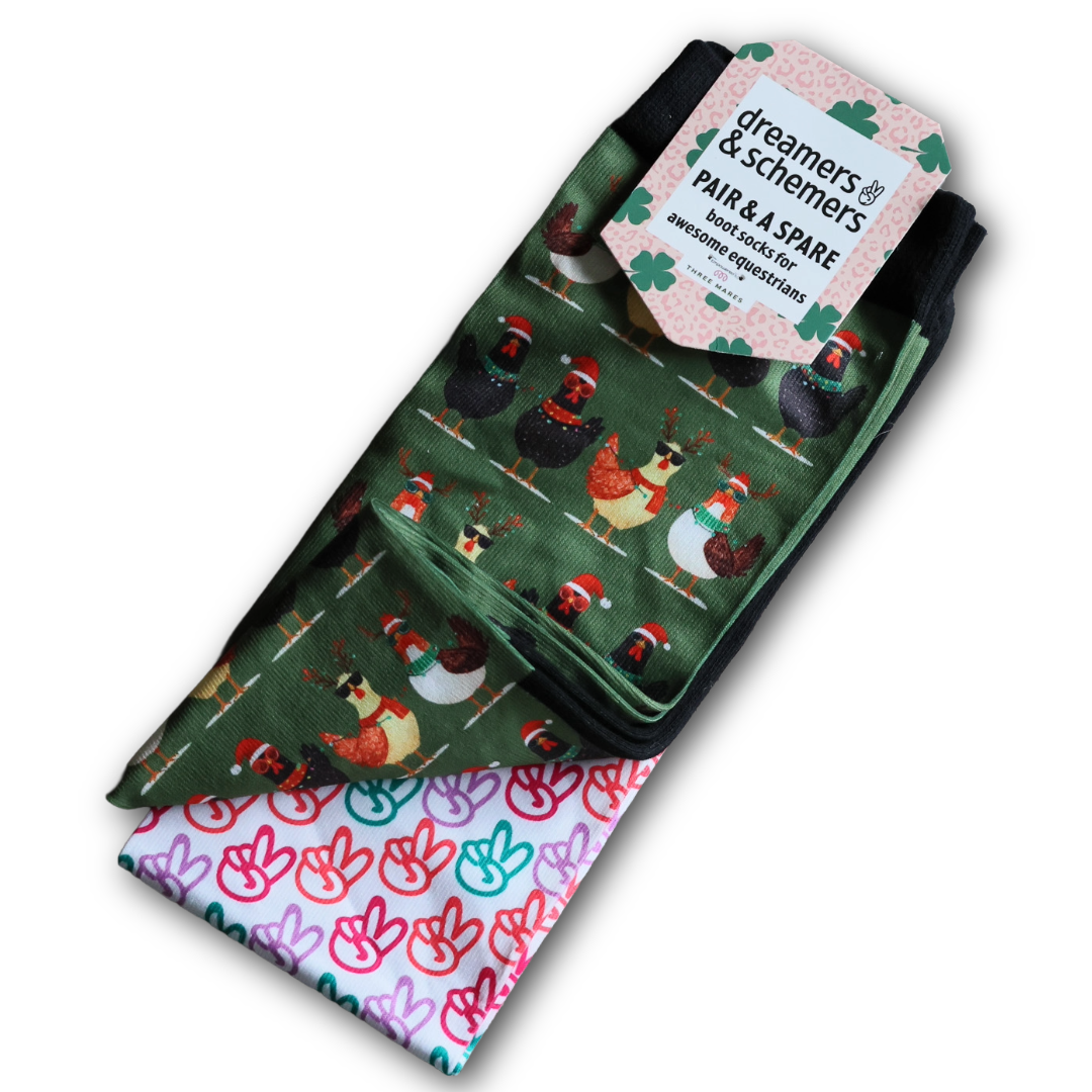 Pair of colorful riding boot socks with chicken and peace sign patterns, featuring extra spare sock included