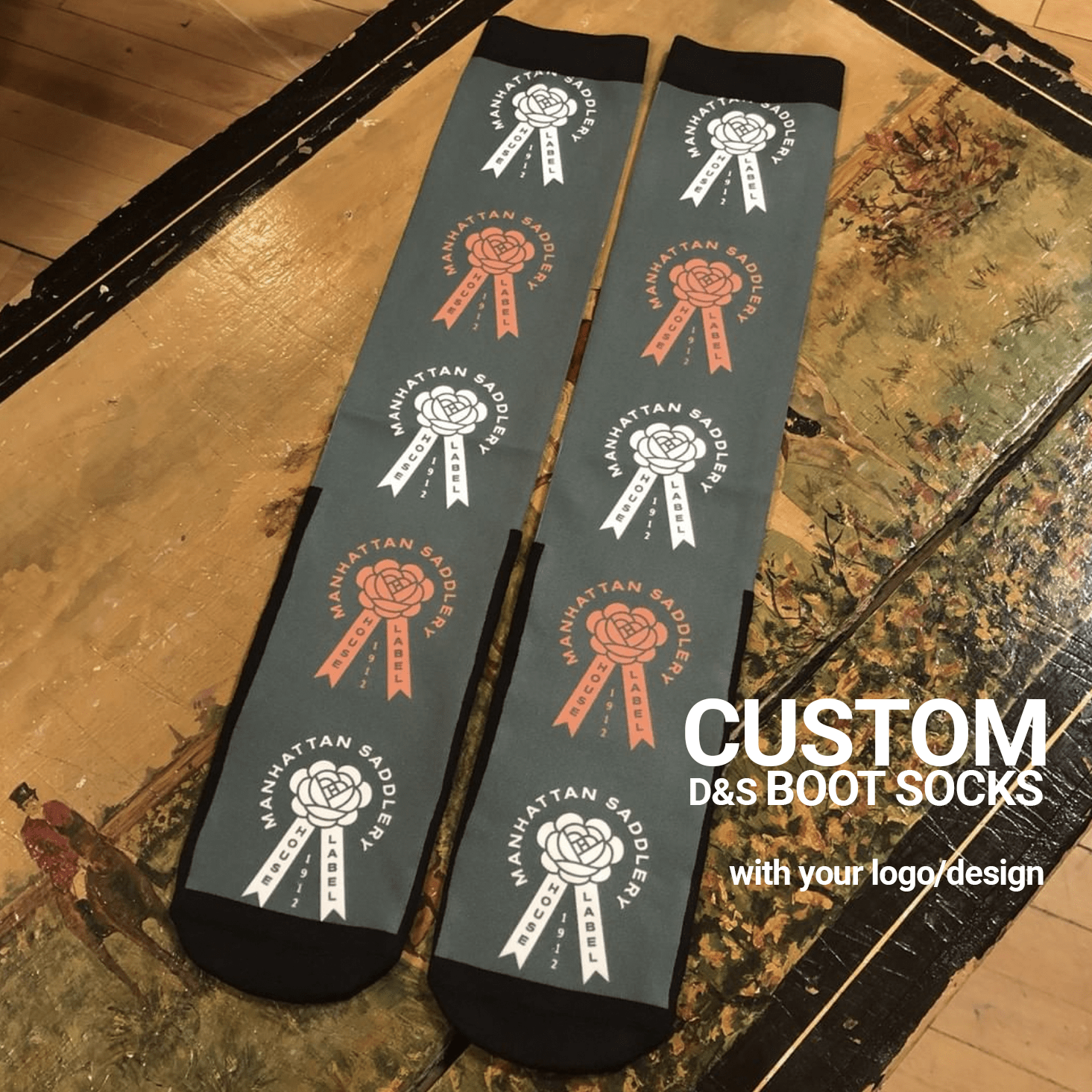 Custom D&S Riding Boot Socks with personalized Manhattan Saddlery logo design on gray background