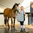 Dreamers & Schemers Deck the Paws Saddle Pad – patterned saddle pad, equestrian gift, horseback riding gear from Dreamers & Schemers Saddle Pads