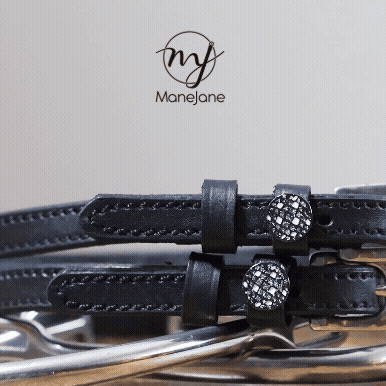 Black leather Disco Ball Spur Straps with stainless steel buckle and custom charm on peg wall display card