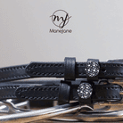 Black leather Disco Ball Spur Straps with stainless steel buckle and custom charm on peg wall display card