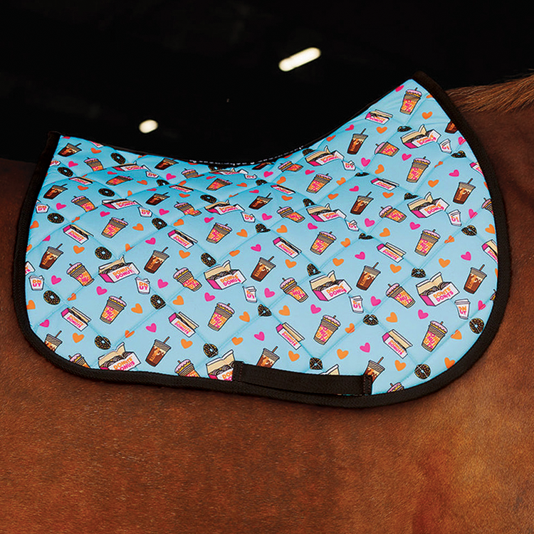 Blue Donut Saddle Pad with coffee and heart pattern on horse back