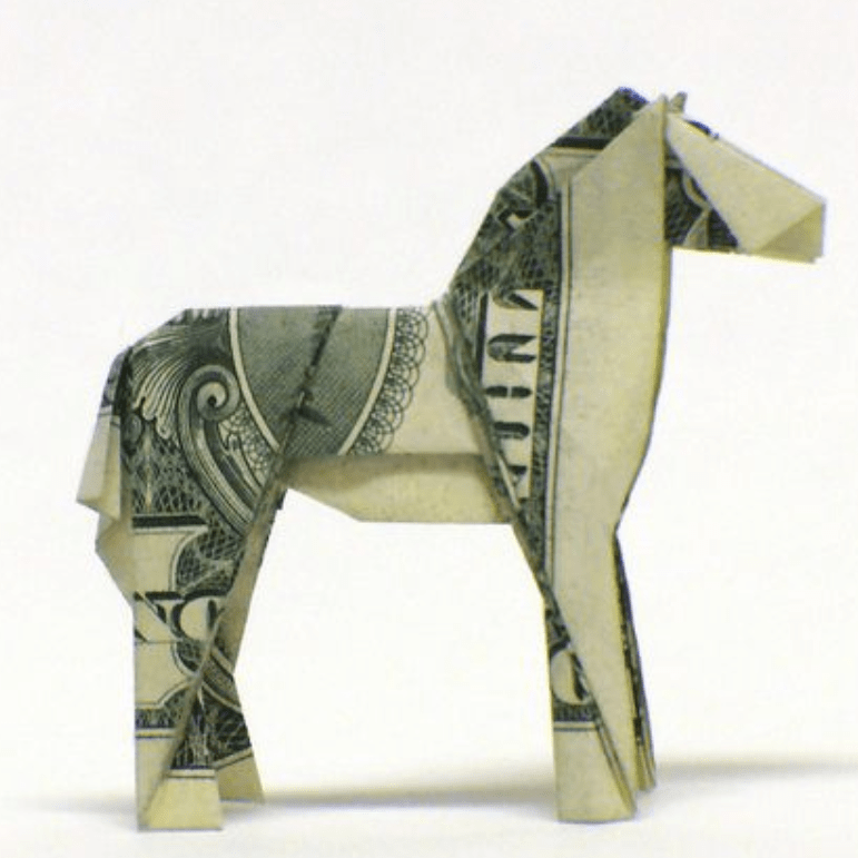 Origami horse made from a folded US dollar bill representing a digital gift card concept